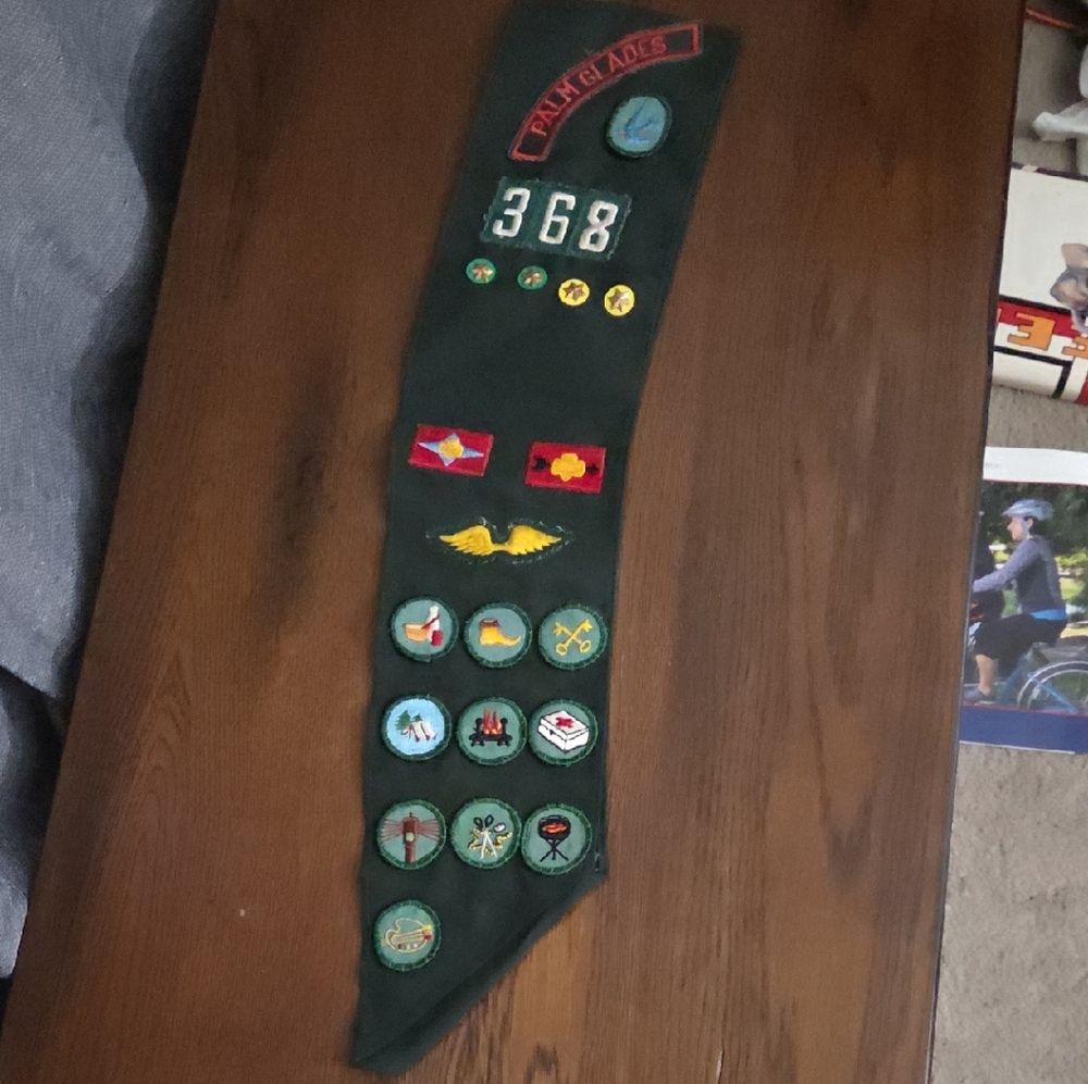 Green Sash with Assorted Patches
